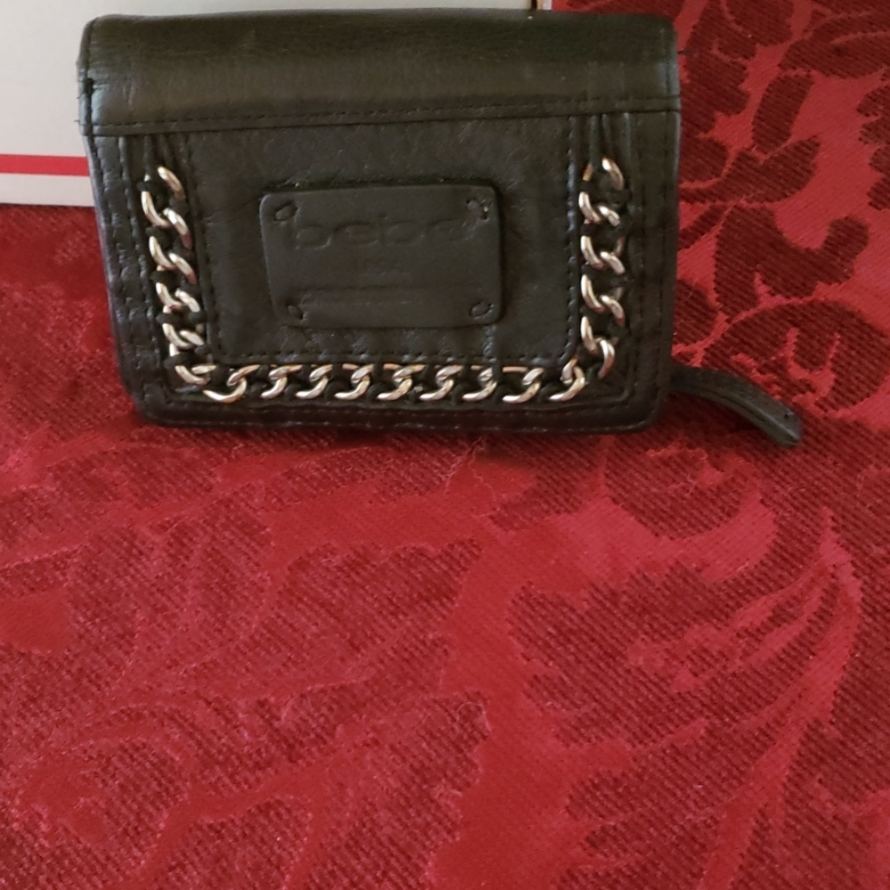 Bebe Wallet. BLack leather/silver chain details.
